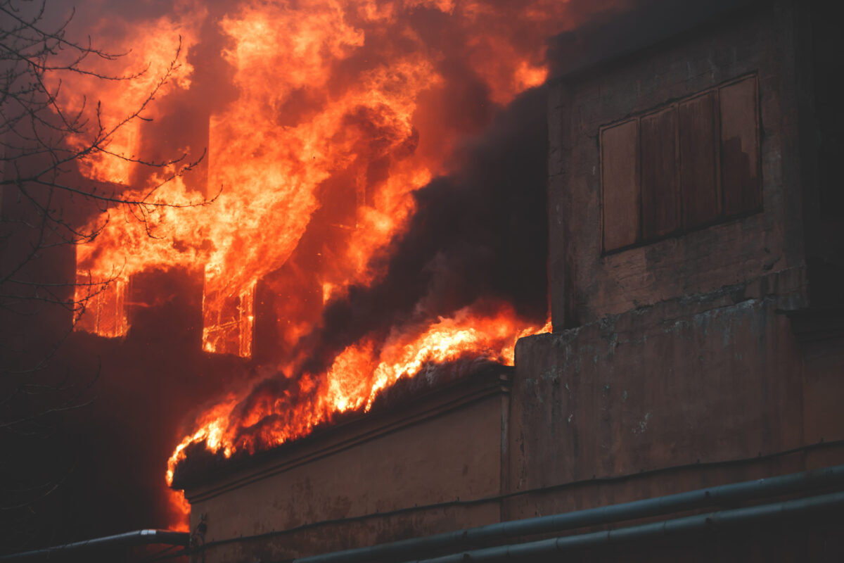 10 Dangerous Situations Most People Wouldn’t Survive 1 Massive large blaze fire in the city, brick factory building on fire, hell major fire explosion flame blast, with firefighters team firemen on duty, arson, burning house destruction