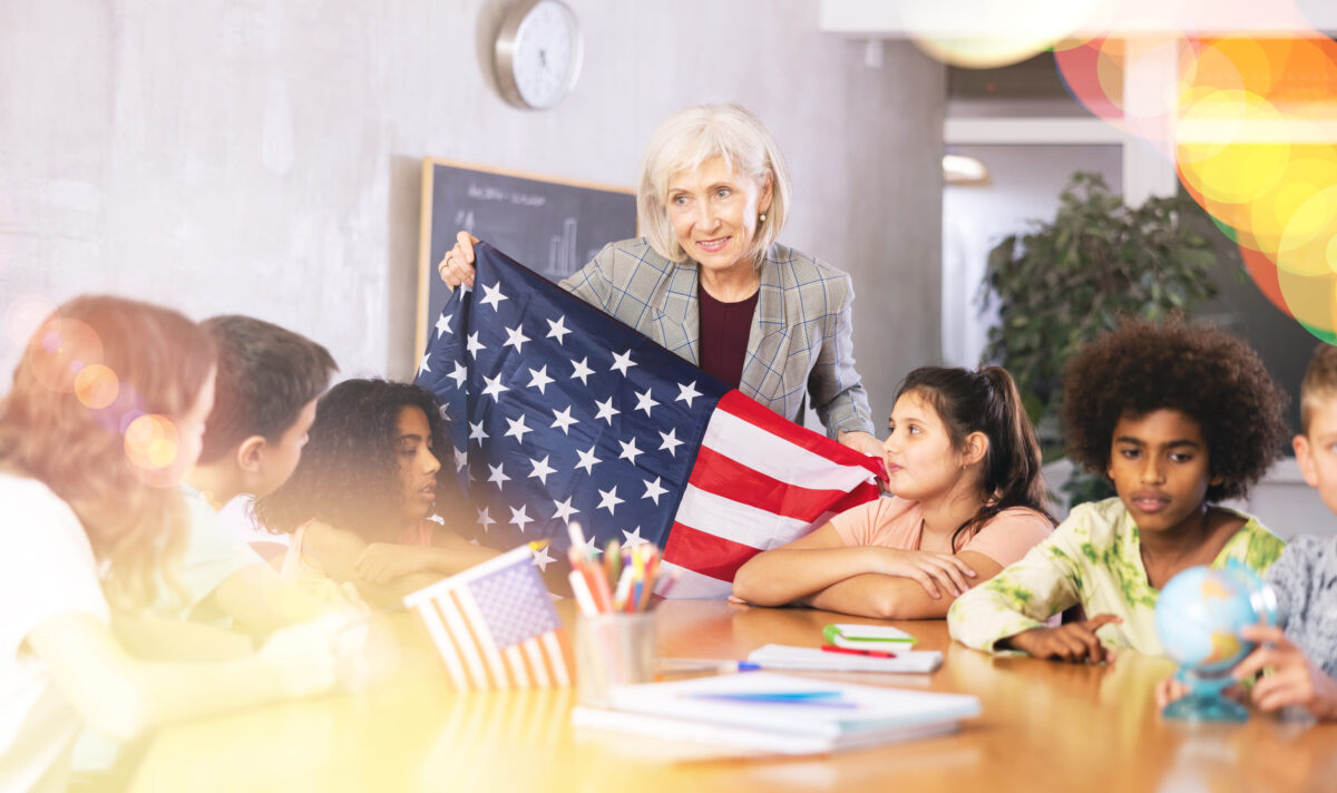 Texas Bible Curriculum Vote Turns Classrooms Into the Latest Culture-War Battleground 2 Friendly female teacher tells the pupils the history of the USA
