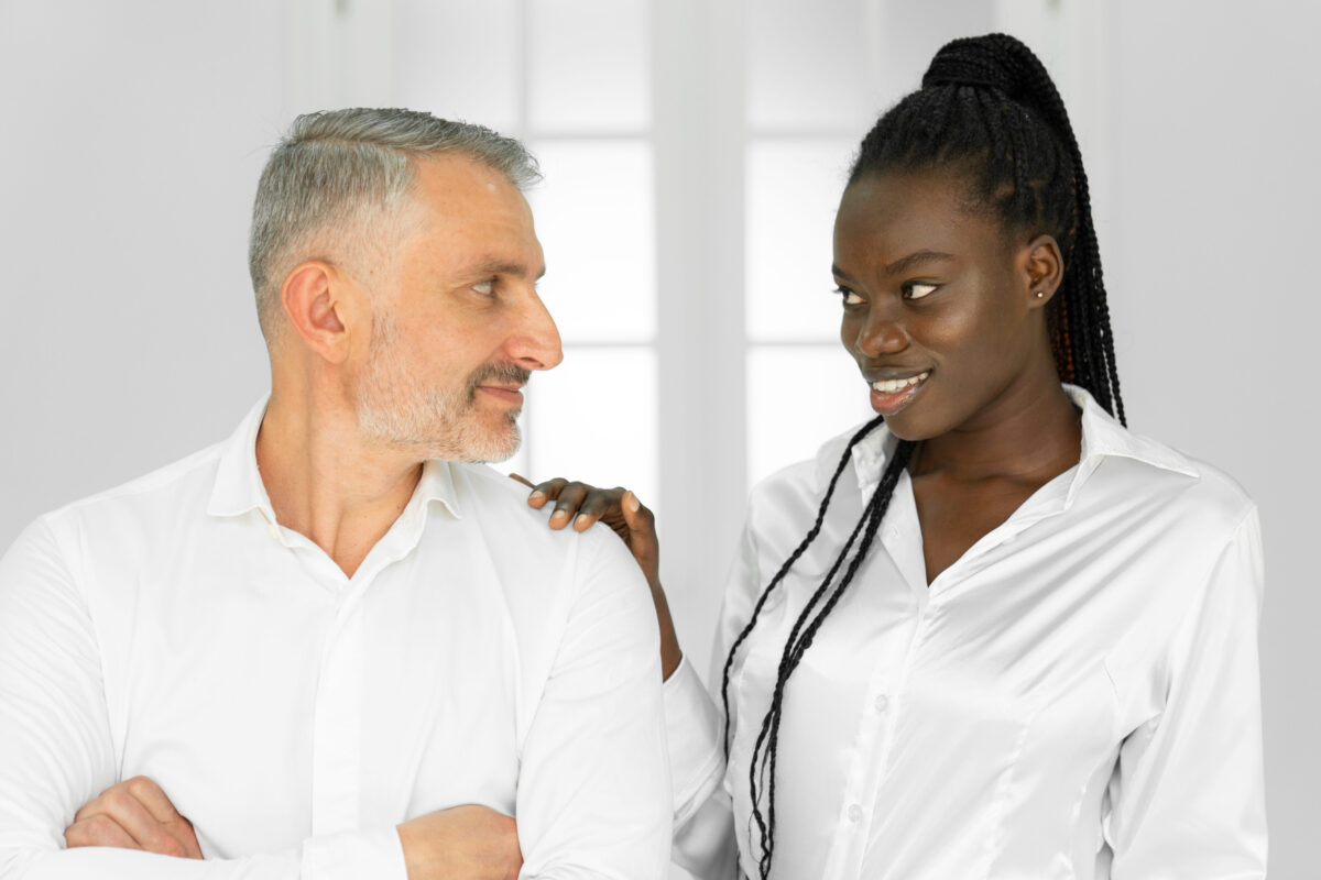7 Types of Women Mature Men Rarely Walk Away From 3 African woman molesting her male colleague in office, closeup. Sexual harassment at work