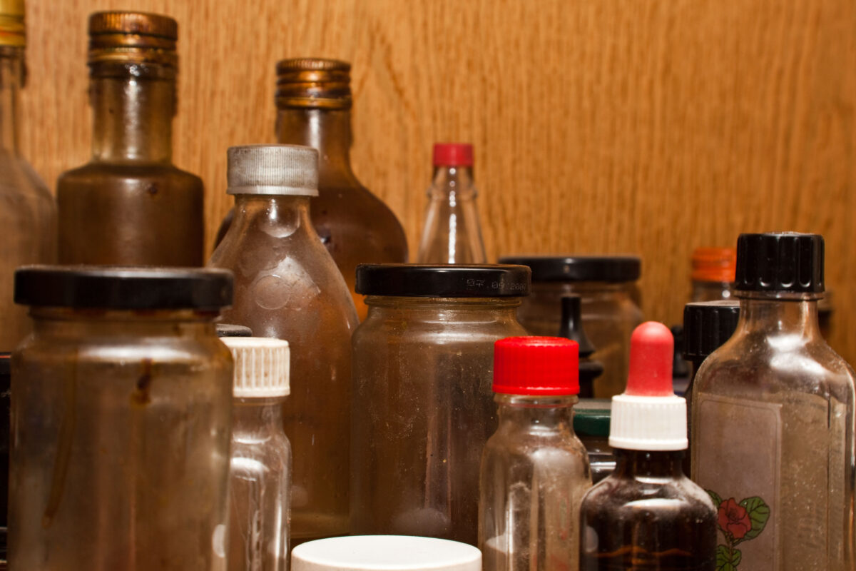 An assortment of small old bottles.