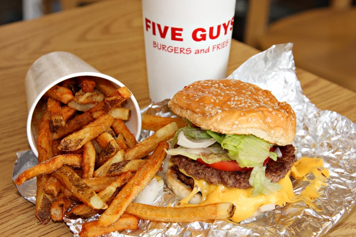 12 Chain Restaurants That Lost People the Moment Prices Skyrocketed 2 Five Guys Burgers and Fries