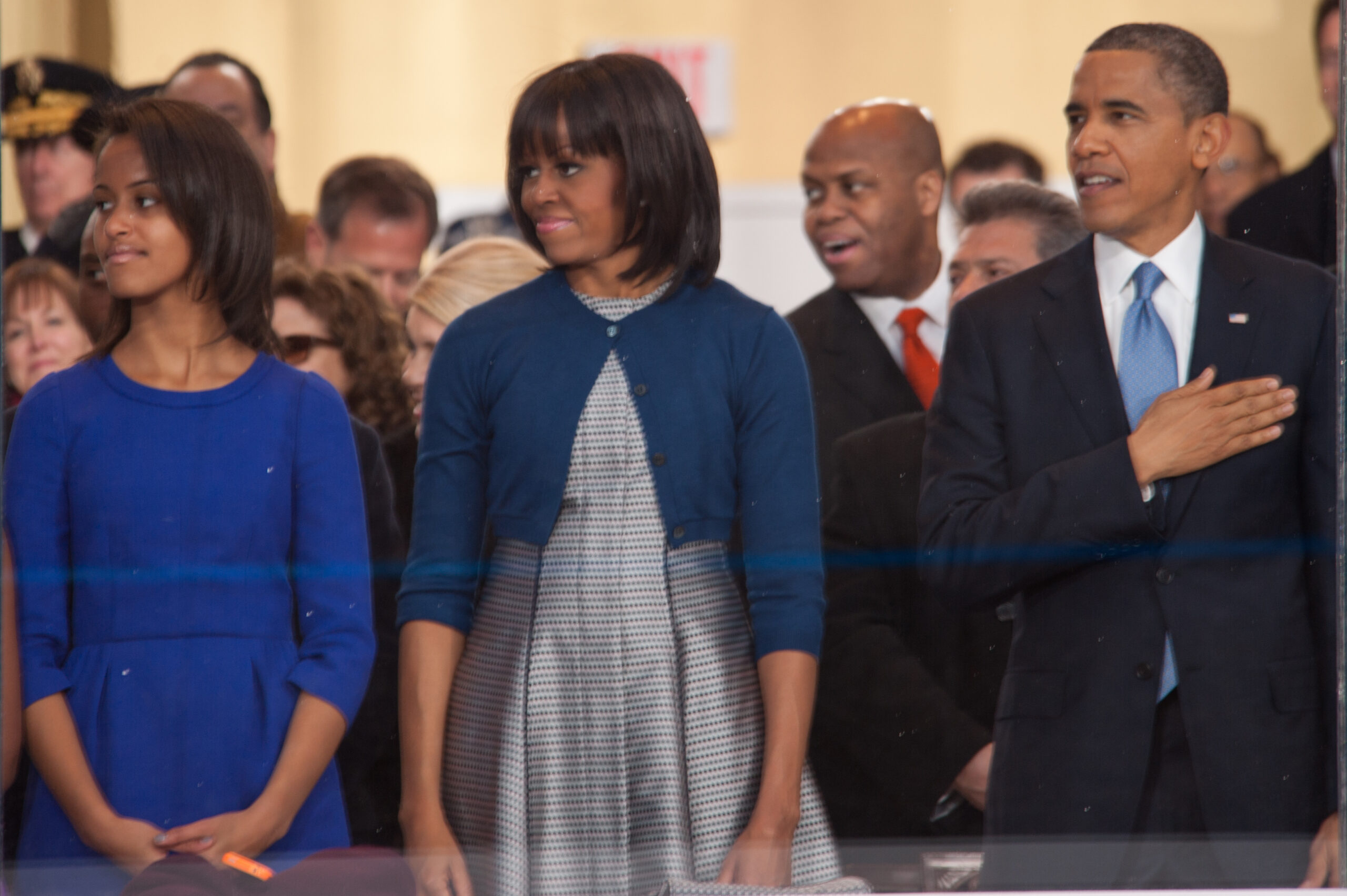 Obama family watches 57th Presidential Inaugural Parade 130121 Z QU230 243 scaled