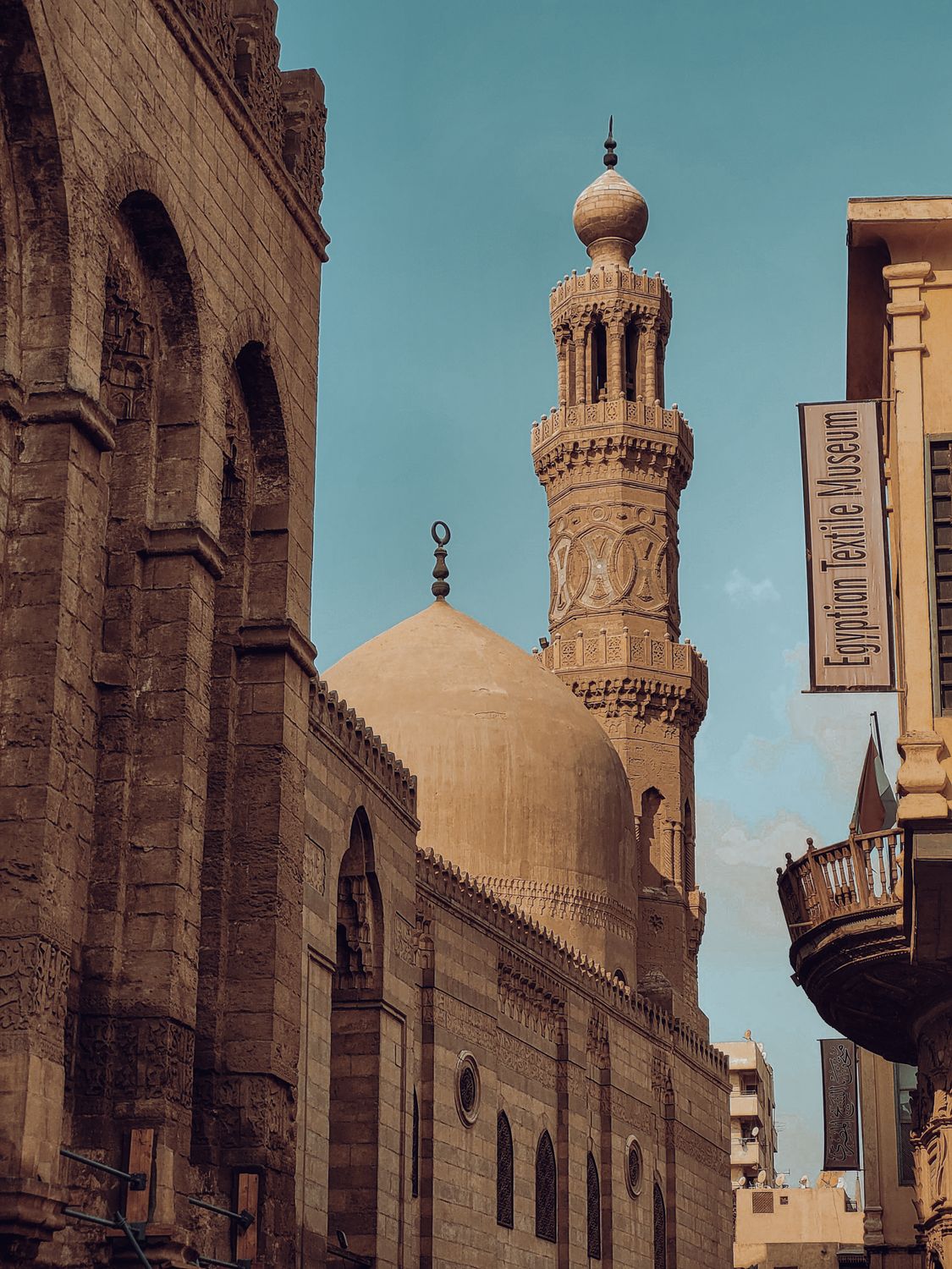 A beautiful view of the minaret and architecture of Al-Azhar Mosque in Cairo, showcasing Islamic design.