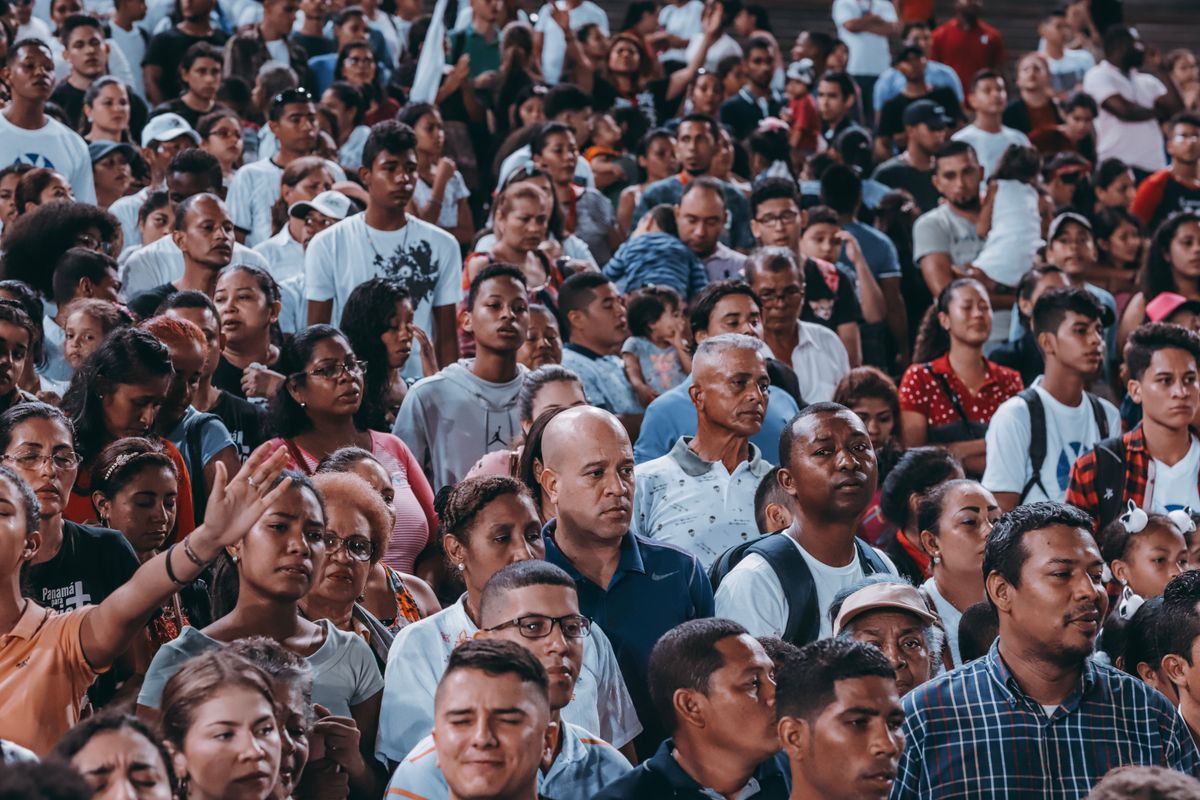 Kay Granger, Trailblazing Texas Politician and First Female Fort Worth Mayor, Dies at 83 2 A large, diverse crowd gathers outdoor, showcasing unity and community spirit.