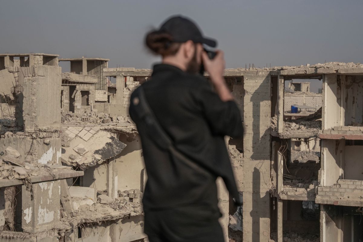 A photographer captures the crumbling ruins of war-torn Damascus, Syria.