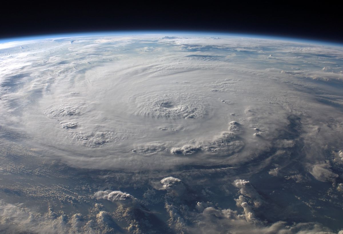 Hurricane preparedness for Florida, Texas, Louisiana, Georgia, and the Carolinas 1 A stunning aerial view of Earth with a massive swirling hurricane, highlighting meteorological beauty.