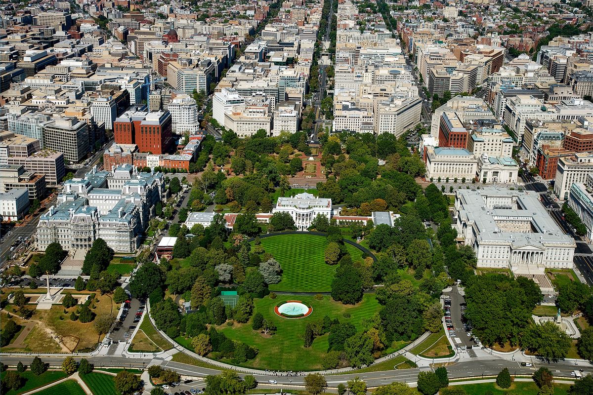 Marco Rubio Delivers Stark Warning to Iran: “The Iranian Regime Has Never Faced a President Like Trump” 1 A stunning aerial view of The White House surrounded by downtown Washington D.C.'s architecture and green spaces.