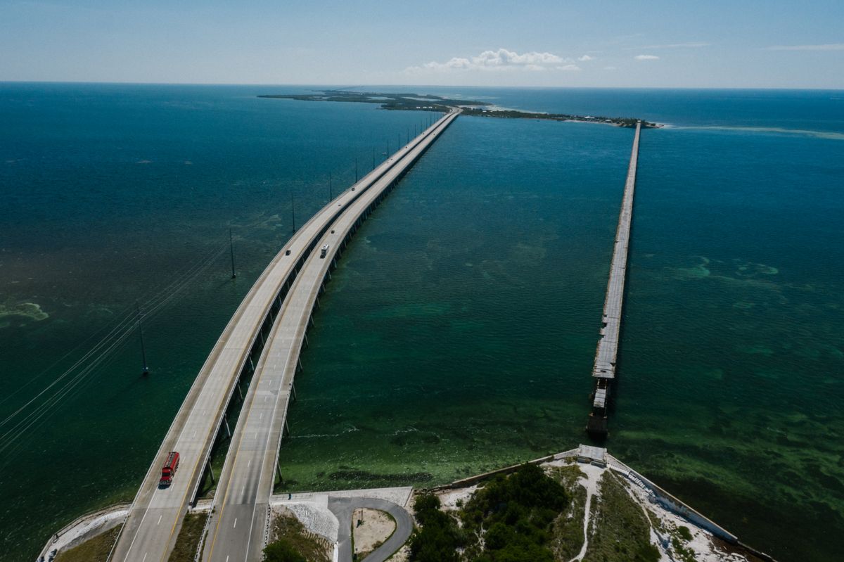 Bridges in the USA Aren’t as Safe or Simple as They Seem 3 Aerial view of the iconic Seven Mile Bridge stretching over the clear blue waters of the Florida Keys.