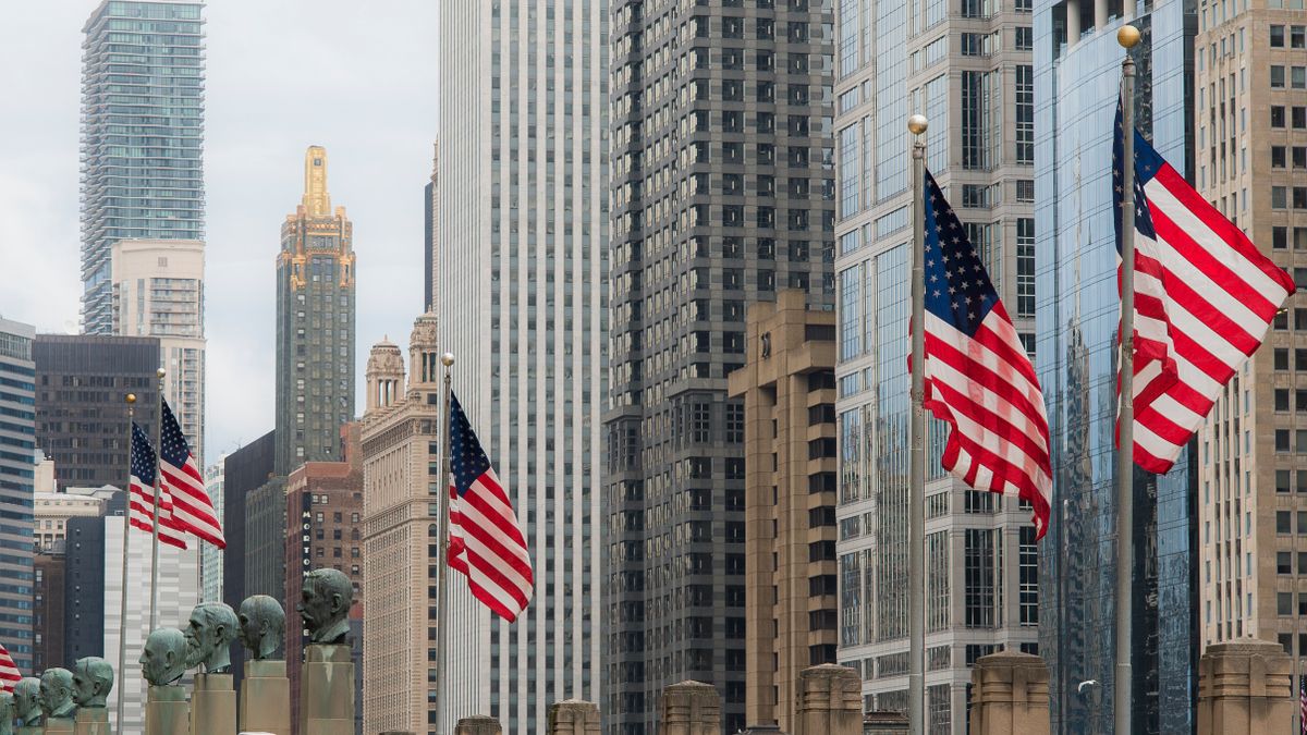 House sends landmark housing bill to Trump as America’s affordability crisis enters a new phase. 1 Chicago cityscape featuring American flags and iconic skyscrapers.