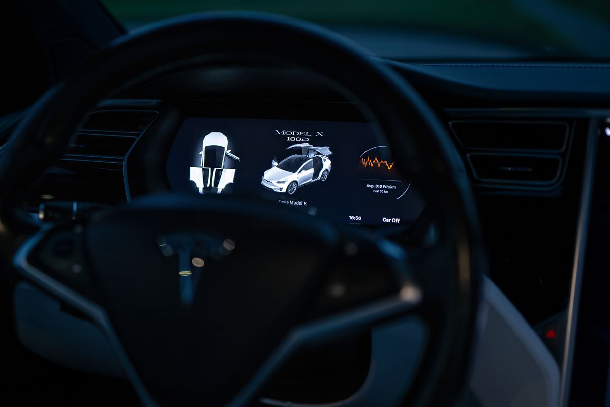 Grandmother Killed Inside Texas Home as Tesla Lawsuit Puts Full Self-Driving on Trial 1 Close-up of a Tesla Model X dashboard display, showcasing advanced technology features.