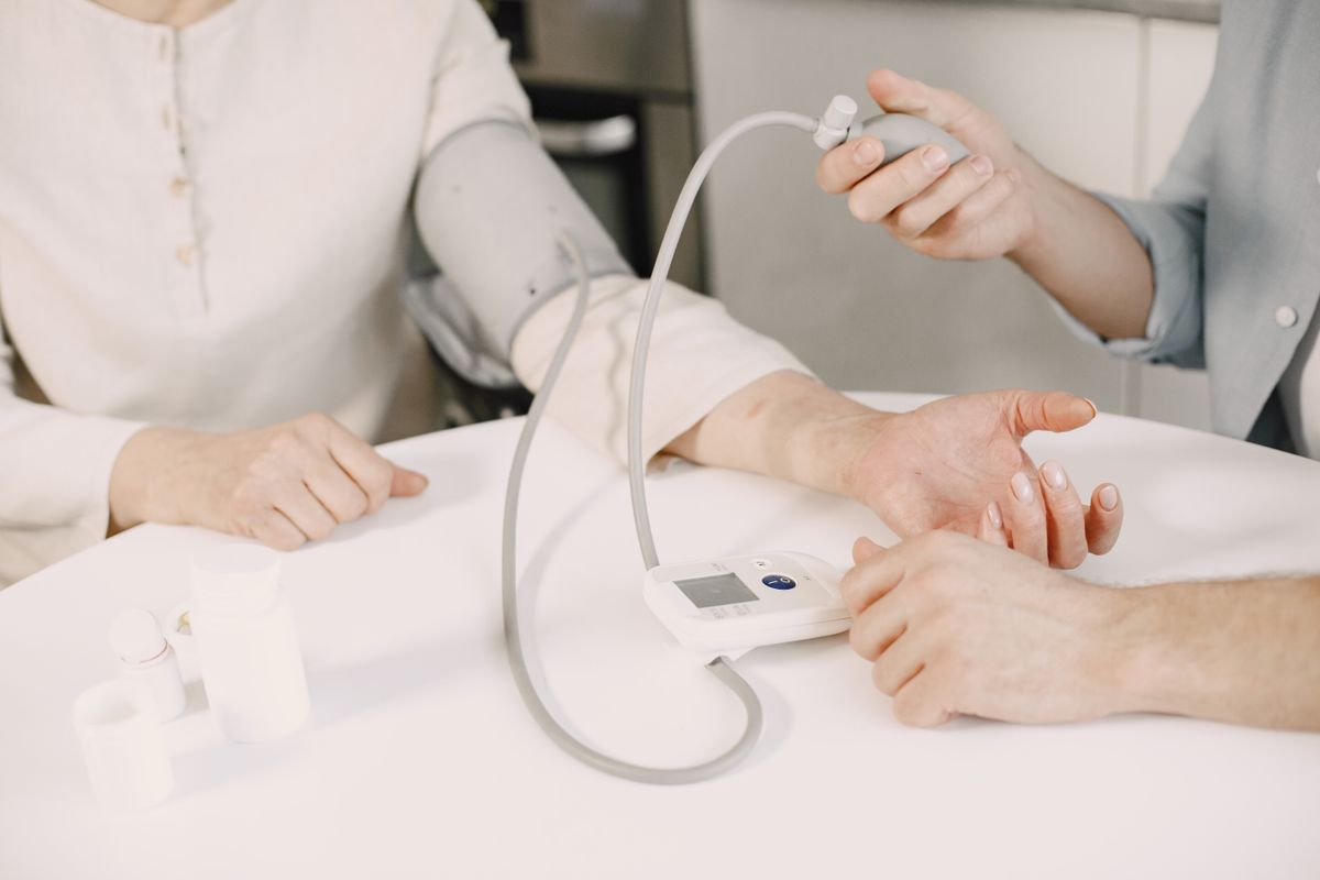 The Cost of Living Calculator Could Be the Reality Check Your Next Move Needs 3 Close-up of blood pressure measurement at home highlighting healthcare equipment.