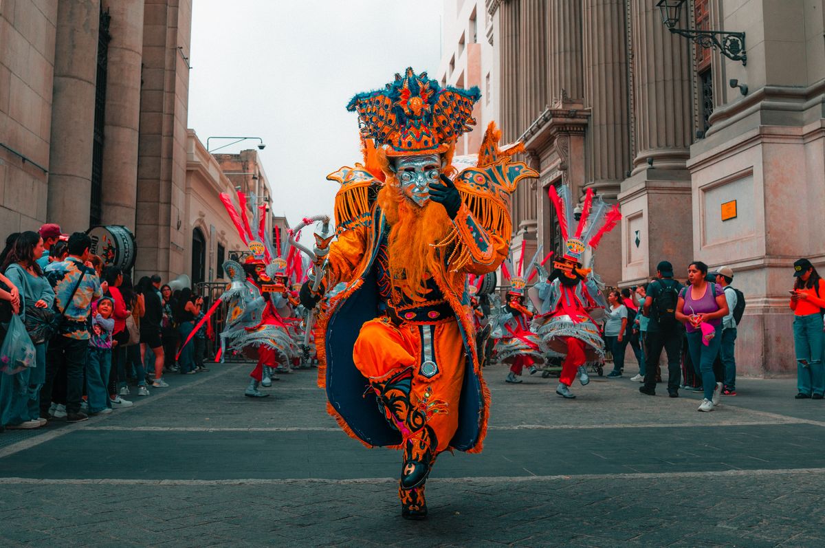 Colorful traditional parade in Lima showcasing Peruvian culture and vibrant costumes.