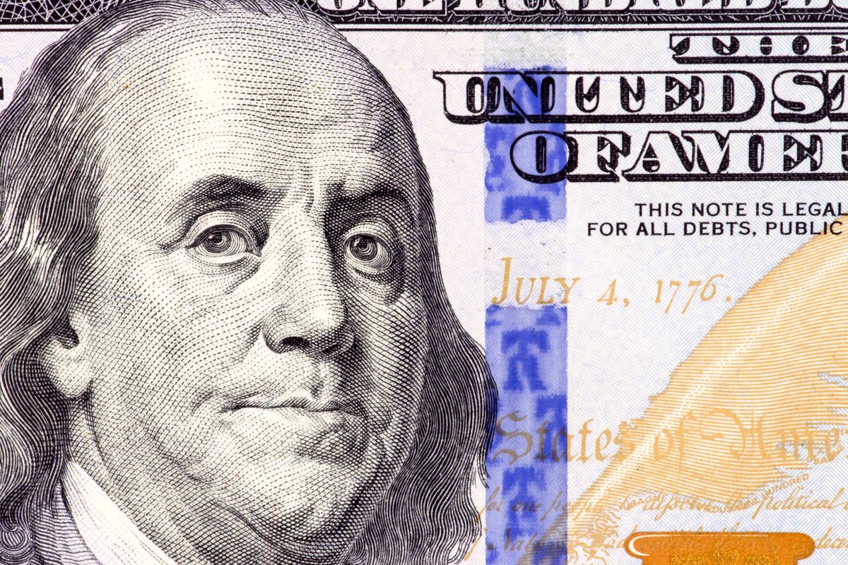 8 Troubling Places America’s Trillions in Debt Really End Up 3 Detailed close-up of Benjamin Franklin's portrait on a 100 dollar bill showing July 4, 1776.