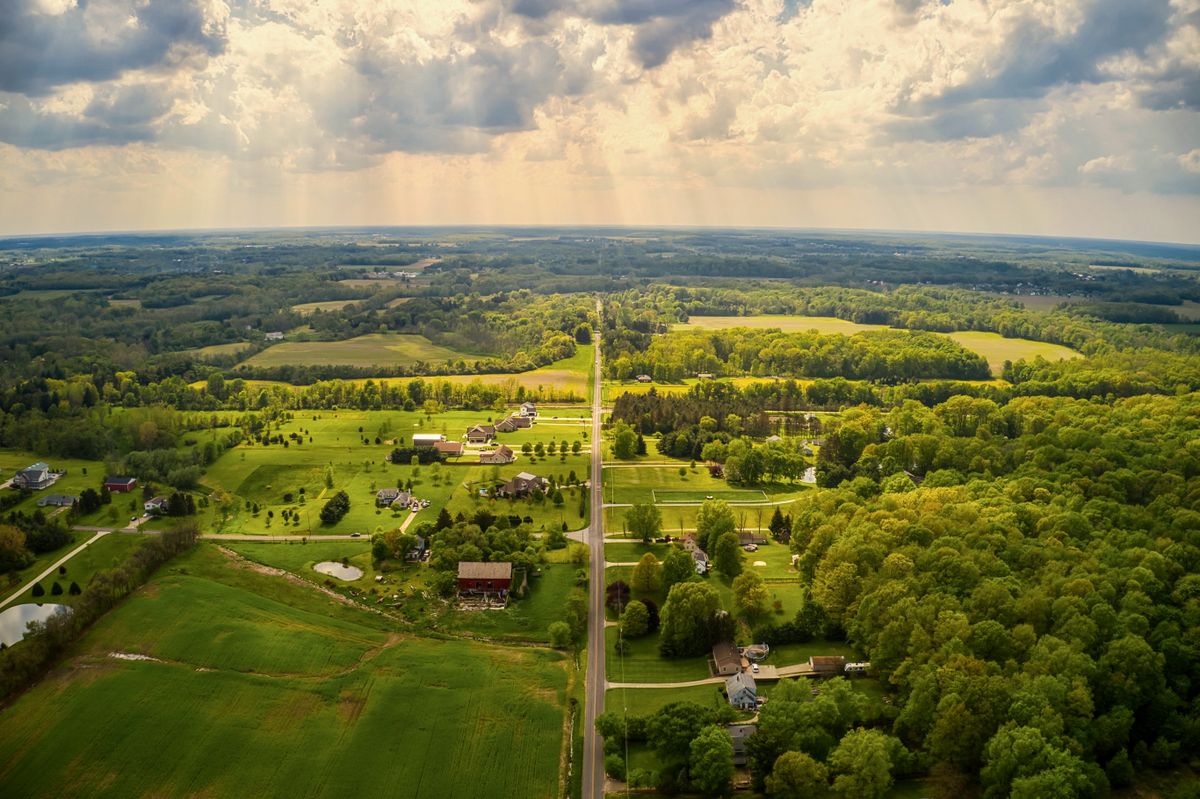 Rural America’s Housing Problem Is No Longer Hidden Behind the Pretty Scenery 1 Discover the scenic aerial view of Valley City, Ohio, showcasing lush greenery and rural charm on a sunny day.