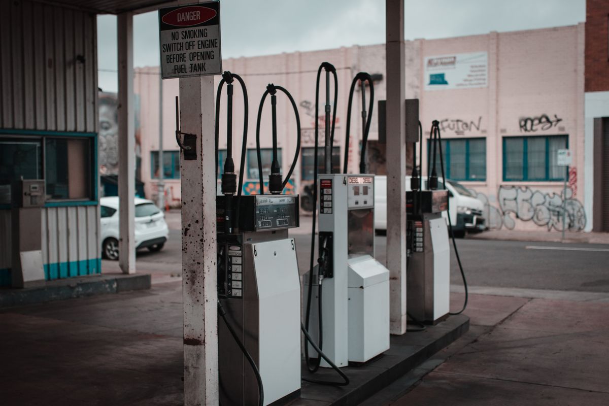 ExxonMobil’s Record Profits Won’t Mean Cheaper Gas Anytime Soon As Refinery Crisis Keeps Pump Prices High 2 Empty gas station with visible graffiti in Collingwood, Australia.