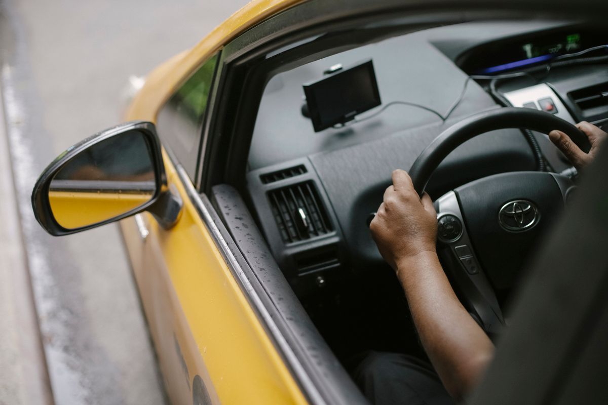 Seattle Drivers Are Getting Another I-5 Headache As Revive I-5 Closures Return 2 From above of crop unrecognizable person driving modern yellow taxi car with GPS navigator on city street in daytime