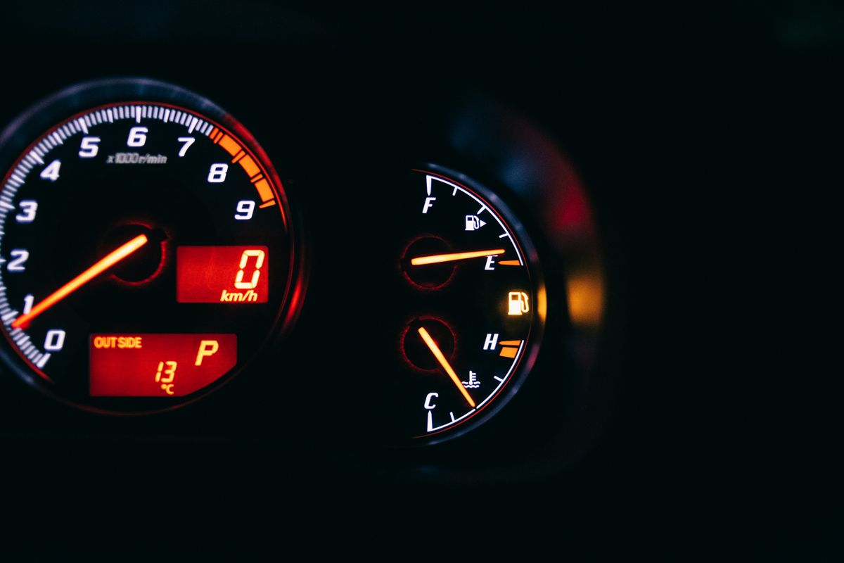 13 Gas Station Mistakes That Are Quietly Draining Your Wallet 1 Modern control and measuring devices with arrows indicating numbers and letters on scales in automobile on black background
