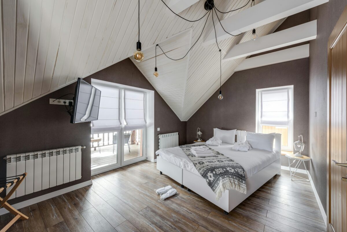 white-bed-near-windows