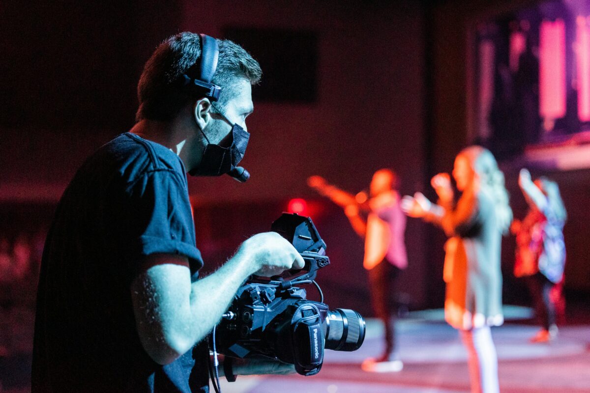 a-camera-operator-recording-a-performance