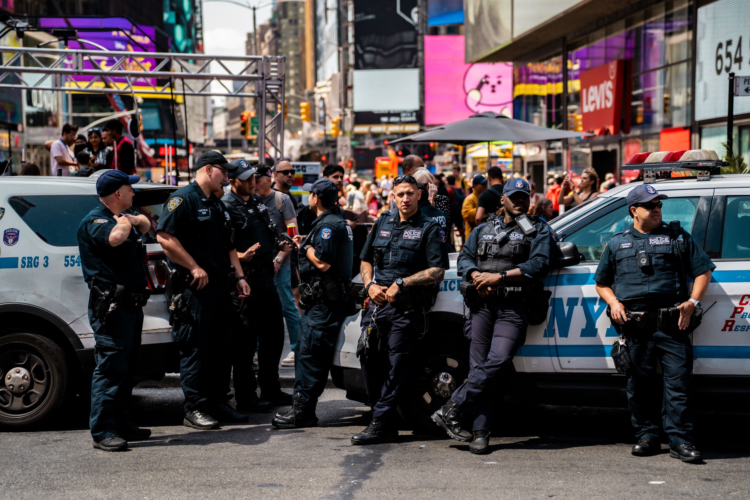 Massive FBI Takedown Across West Virginia and Maryland Signals Summer Push Against Guns, Drugs, and Violent Crime. 1 nypd-officers-on-duty-in-times-square