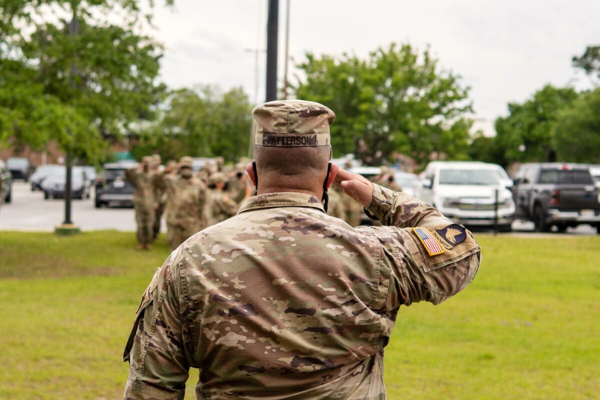 soldier-saluting-flag-flown-at-half-mast