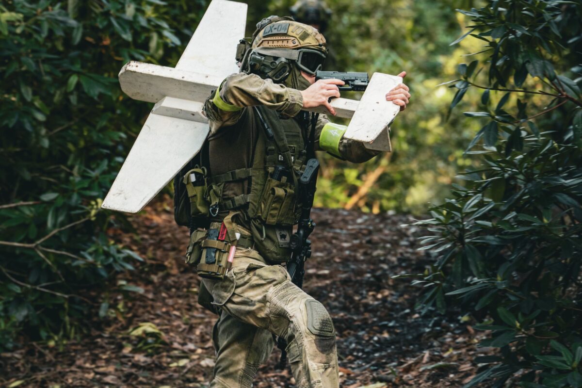 Trump’s Drone War Shift Raised a Bigger Question: Who Decides When America Kills? 1 military-soldier-navigating-forest-with-drone-equipment