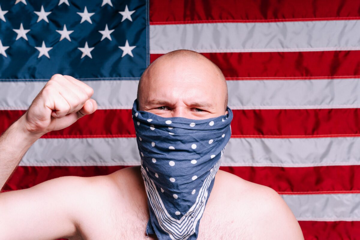 The American Pride Crisis Is No Longer Just Political Noise. 8 Reasons Why 3 man-with-his-fist