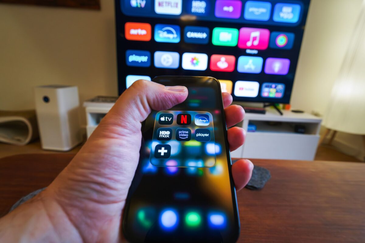 hand-holding-smartphone-with-streaming-apps