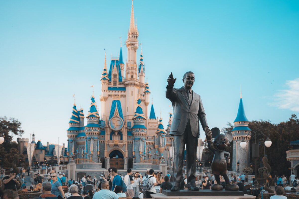 /people-walking-around-disney-castle-