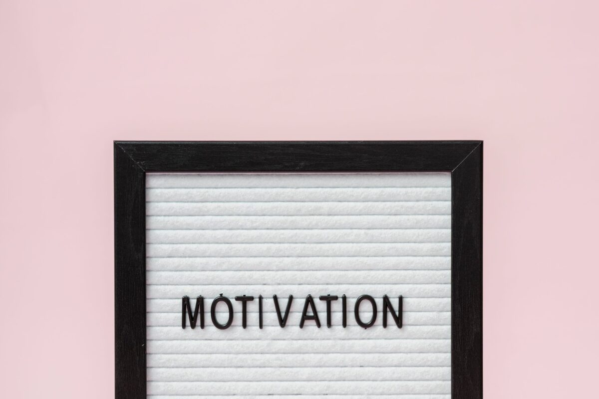 a-letter-board-with-a-pink-background