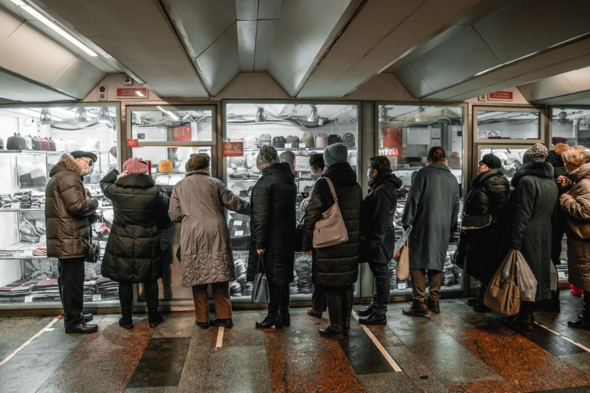 Dollar Stores Keep Opening Across America. What Are They Seeing That Other Retailers Aren’t? 2 people-standing-near-display-window