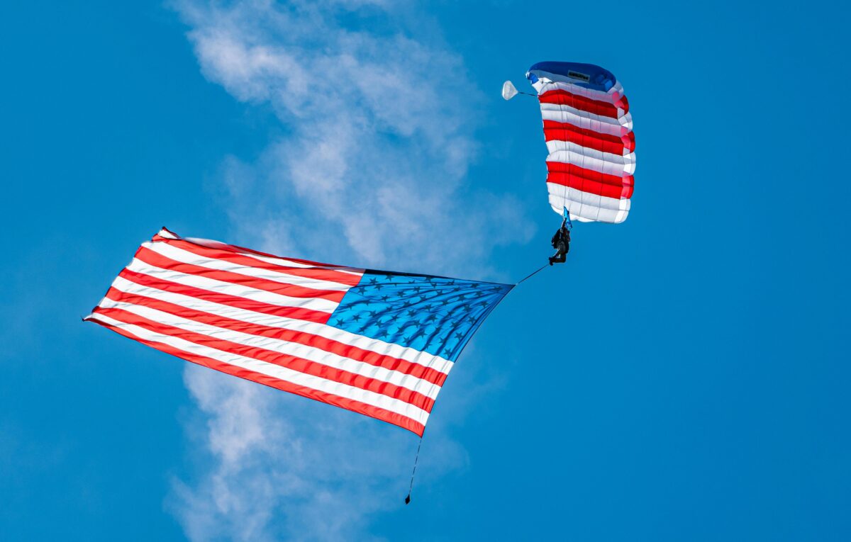 The American Pride Crisis Is No Longer Just Political Noise. 8 Reasons Why 1 skydiver-with-american-flag-parachuting