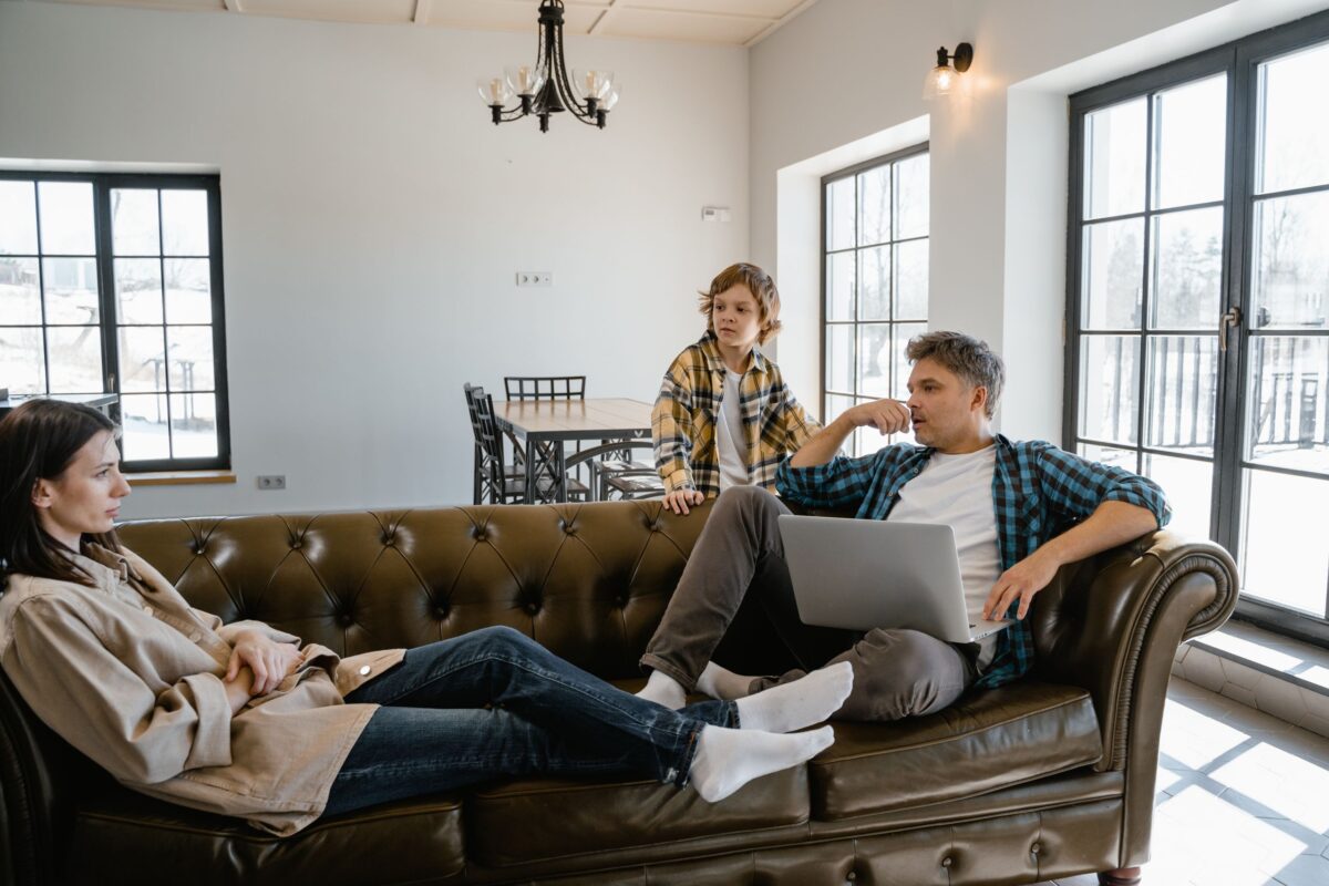 a-family-relaxing-on-the-living-room