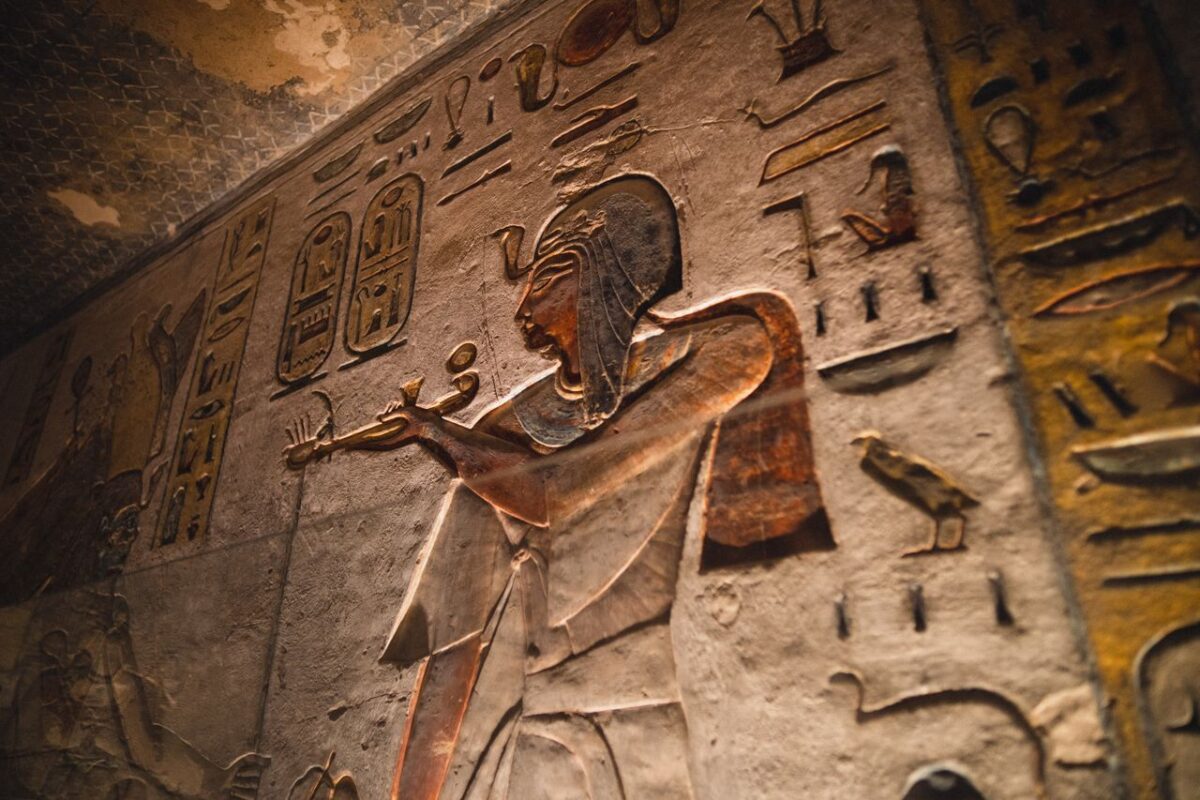hieroglyphs-around-ancient-god-carving-