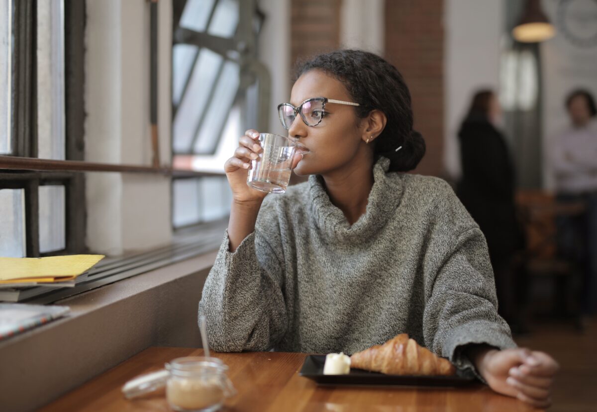 A Lonely Woman In A Café.
