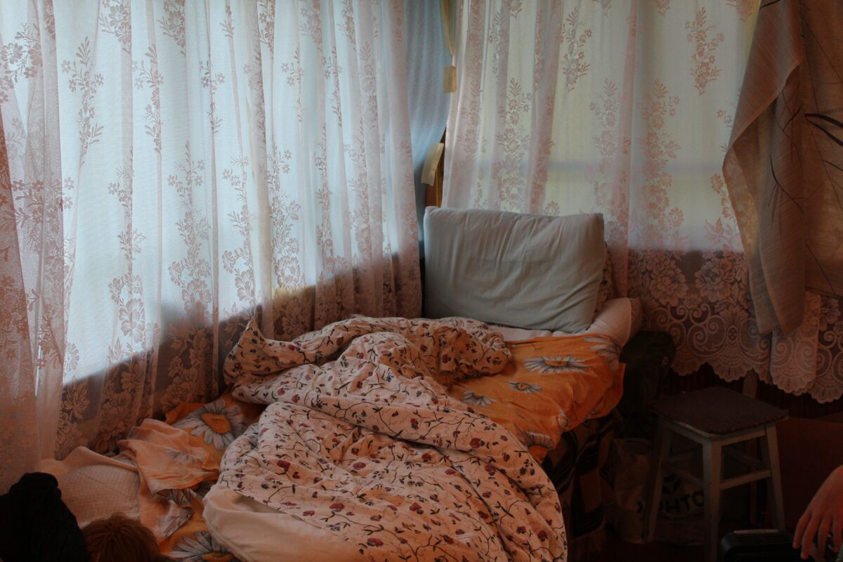 tousled-bed-in-a-traditional-house