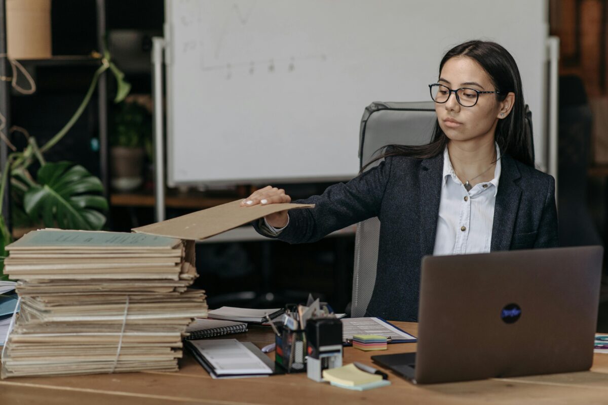 a-boss-holding-a-brown-folder