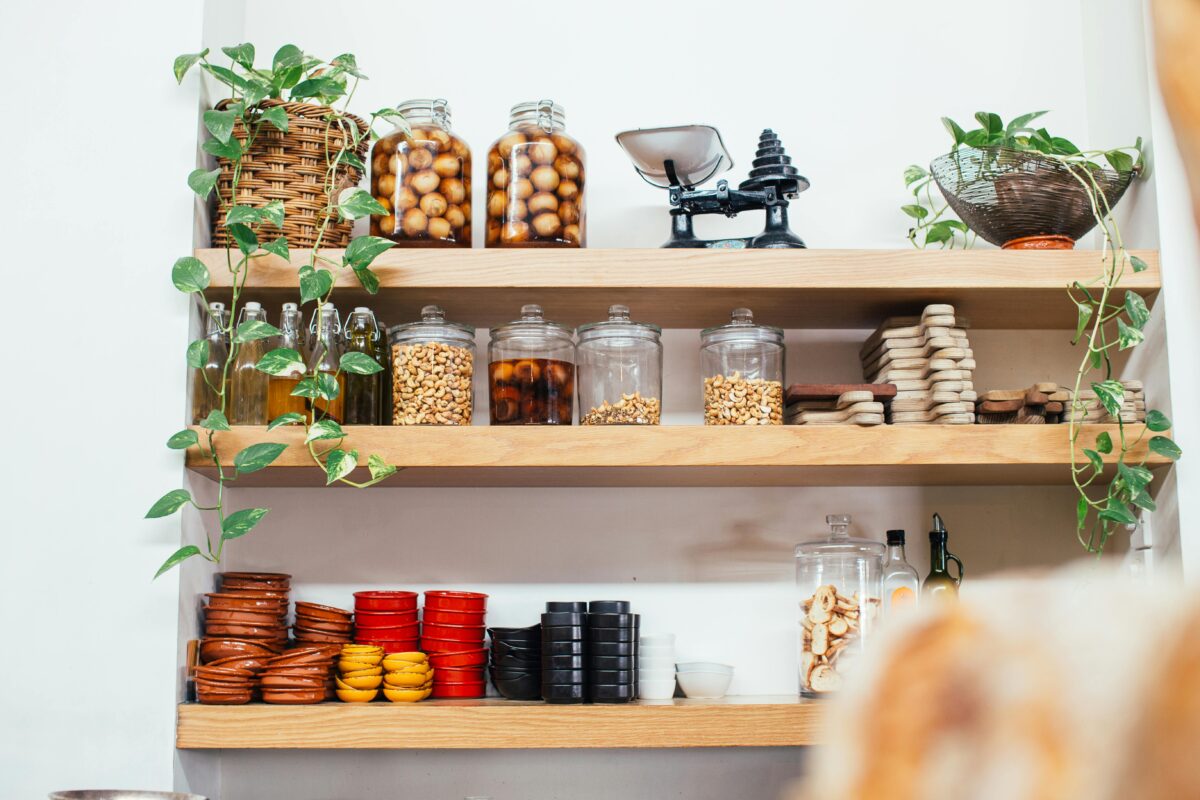 wooden-shelves-with-glass-jars-filled-with-various-ingredients