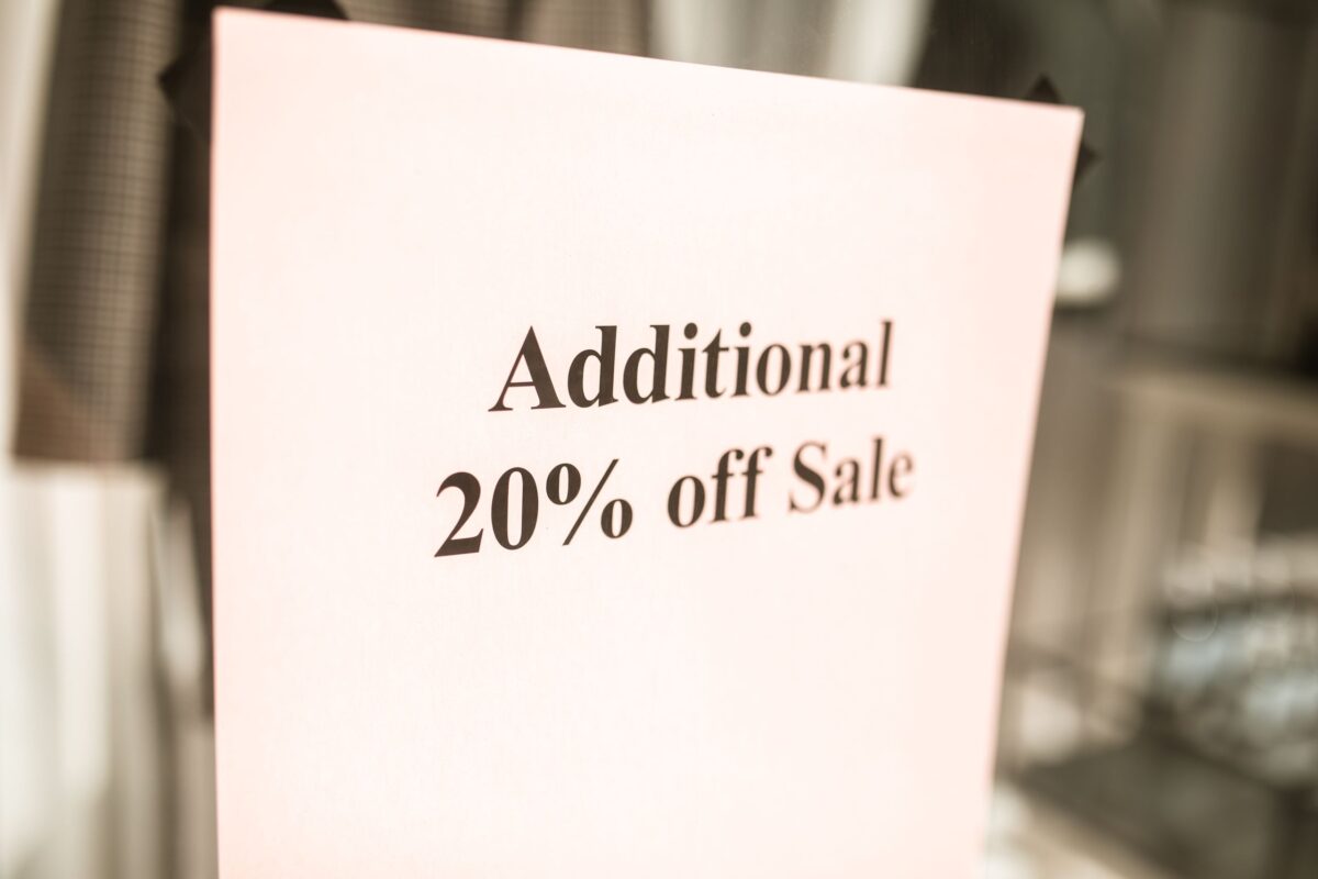 Hidden Fees Became America’s Second Price, And Shoppers Are Finally Pushing Back. 2 a-sign-informing-of-discount-price
