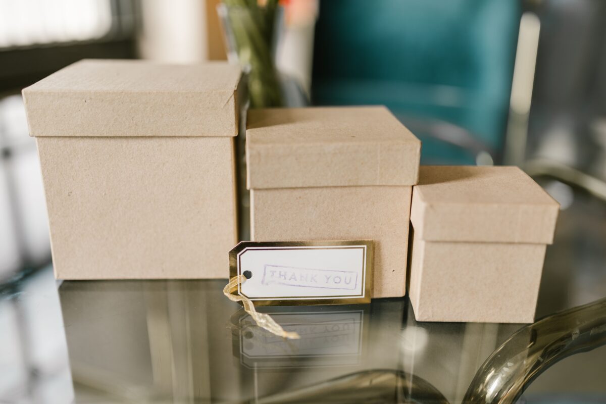 a-close-up-shot-of-brown-boxes-with-lids