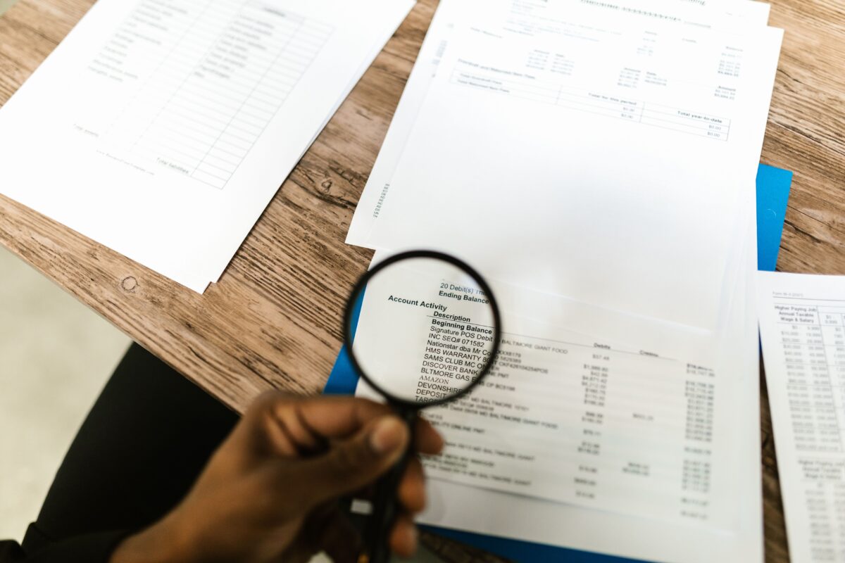 10 Reasons Consumers Are Fed Up With Endless Subscription Services 3 a-person-using-a-magnifying-glass-on-a-document