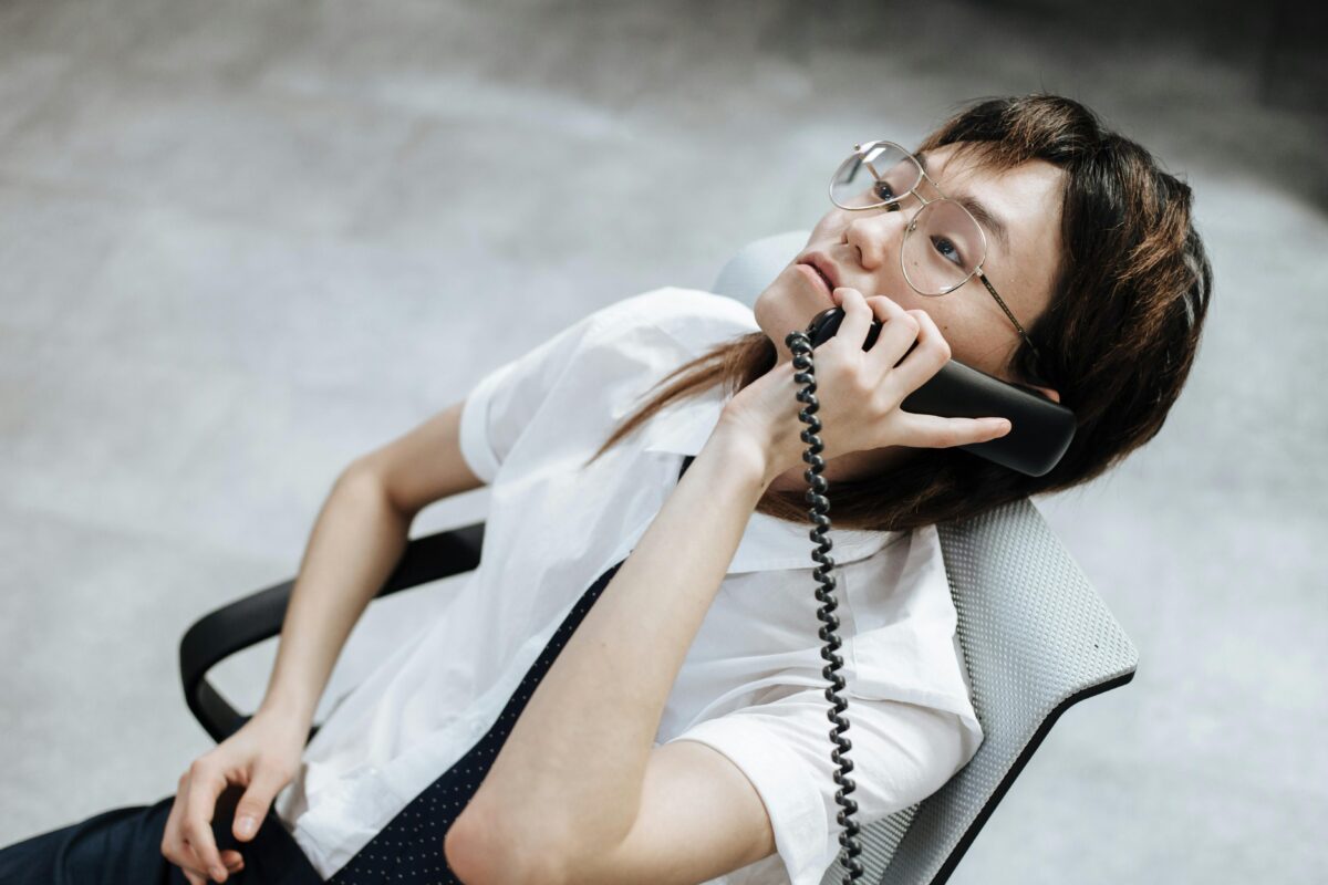 person-wearing-eyeglasses-on-a-telephone-call