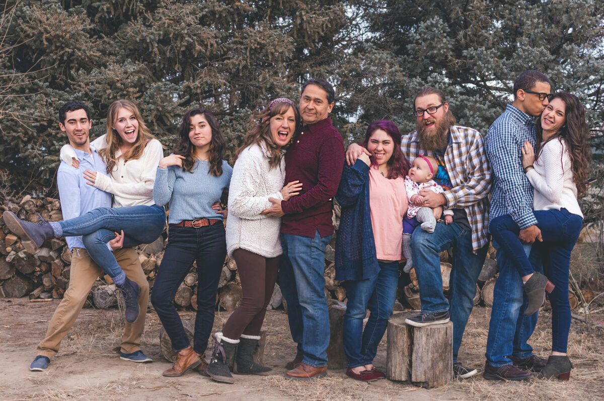 people-taking-photo-front-of-green-tree