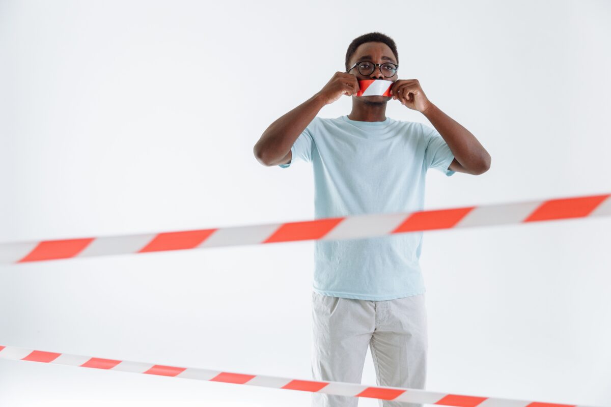 8 Reasons Friendship Burnout Is Becoming More Common Among Adults 4 man-standing-near-the-barricade-tape