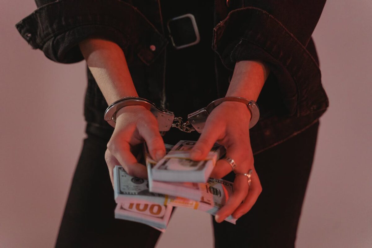 person-holding-10-euro-bill
