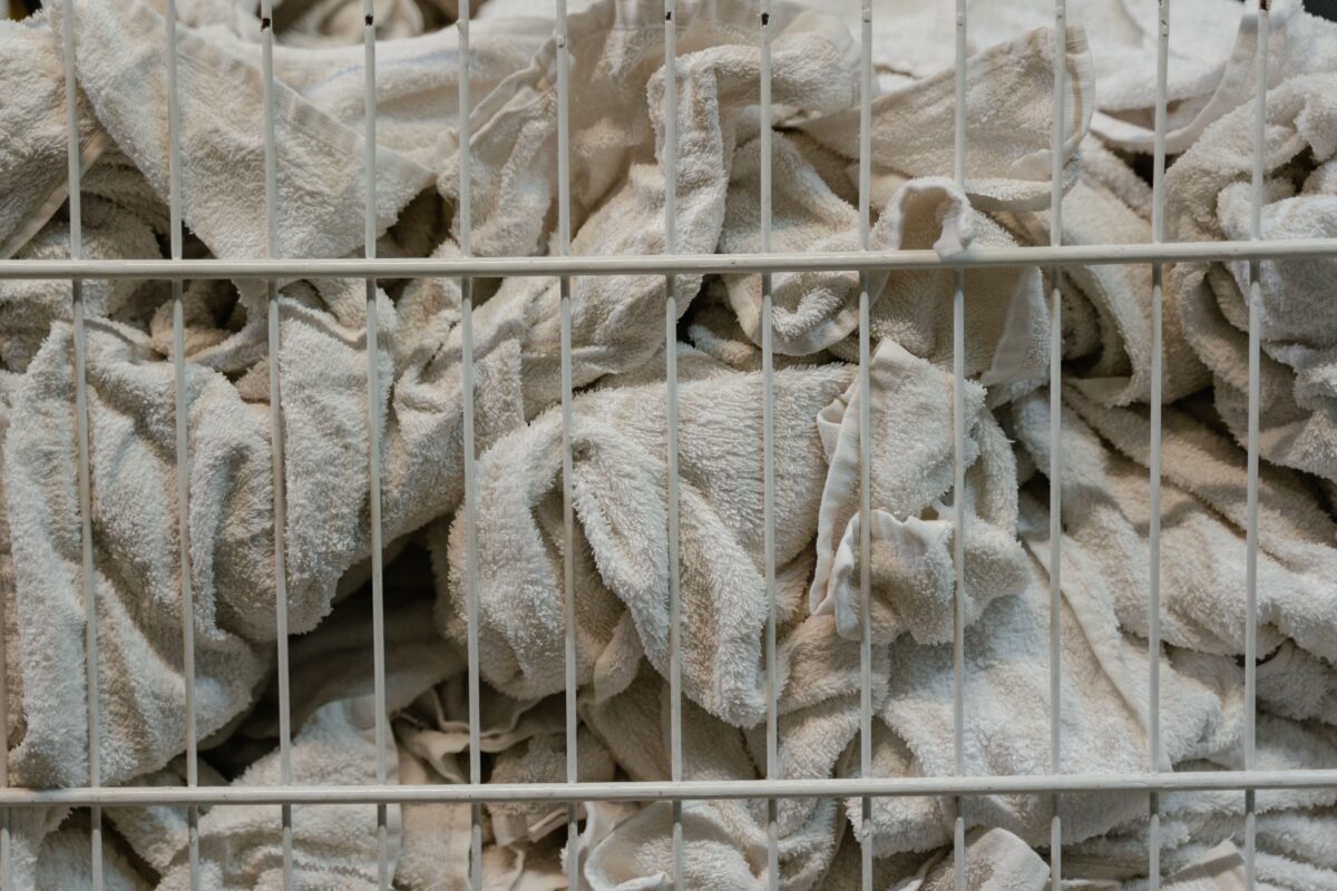 white-towels-inside-metal-basket