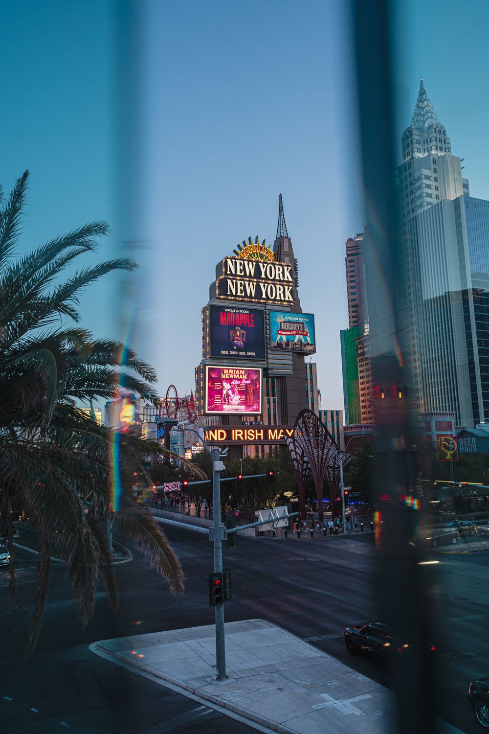Vibrant view of New York-New York Hotel on Las Vegas Strip at sunset.