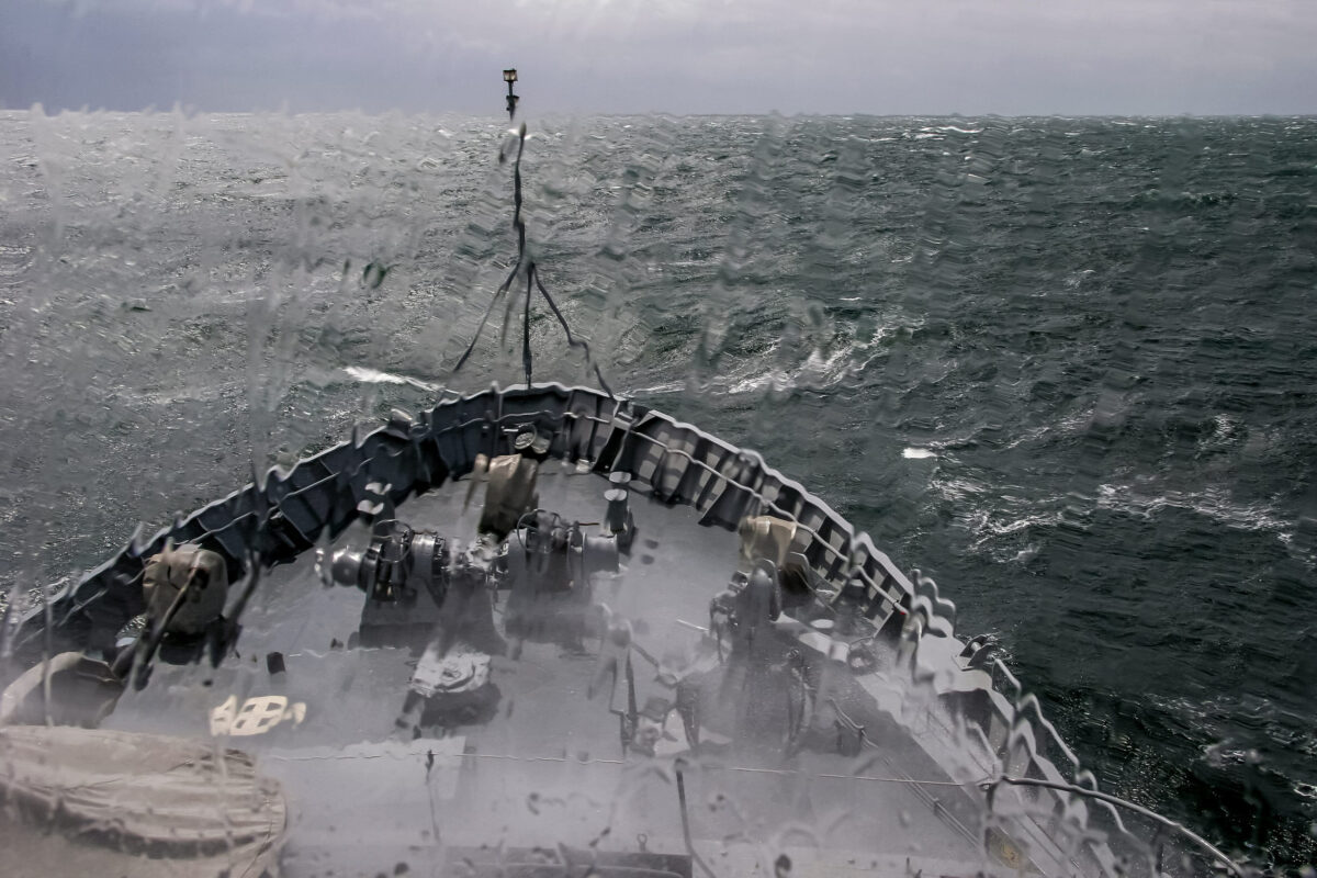 Ukraine Targets Iran-Russia War Network as Caspian Strike Raises Stakes 2 Ship in sea storm. Storm at Baltic sea. Warship training in the Baltic Sea during a storm. NATO military ship in Baltic sea, Latvia. NATO military ship at sea during a storm. view from ships the bow.