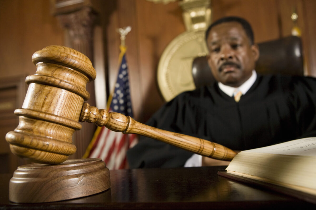 Gavel lying in front of a judge