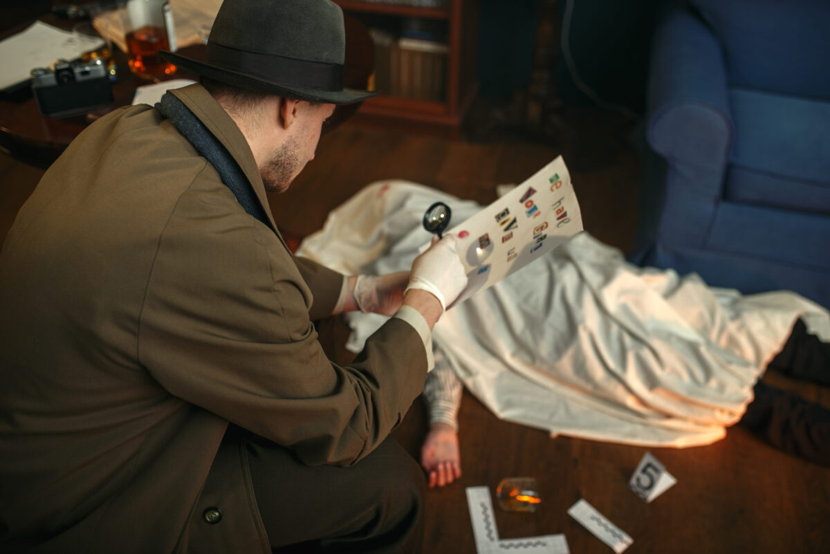 A Cracker Barrel Clue Sat for 40 Years. Now, Ohio Police Say It Helped Break a Cold Case 1 Detective with magnifying glass looking letter